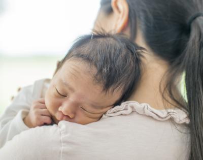 Woman holding her baby
